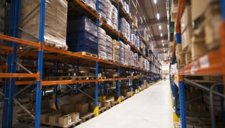 pmax-hydraulik-interior-large-distribution-warehouse-with-shelves-stacked-with-palettes-goods-ready-market
